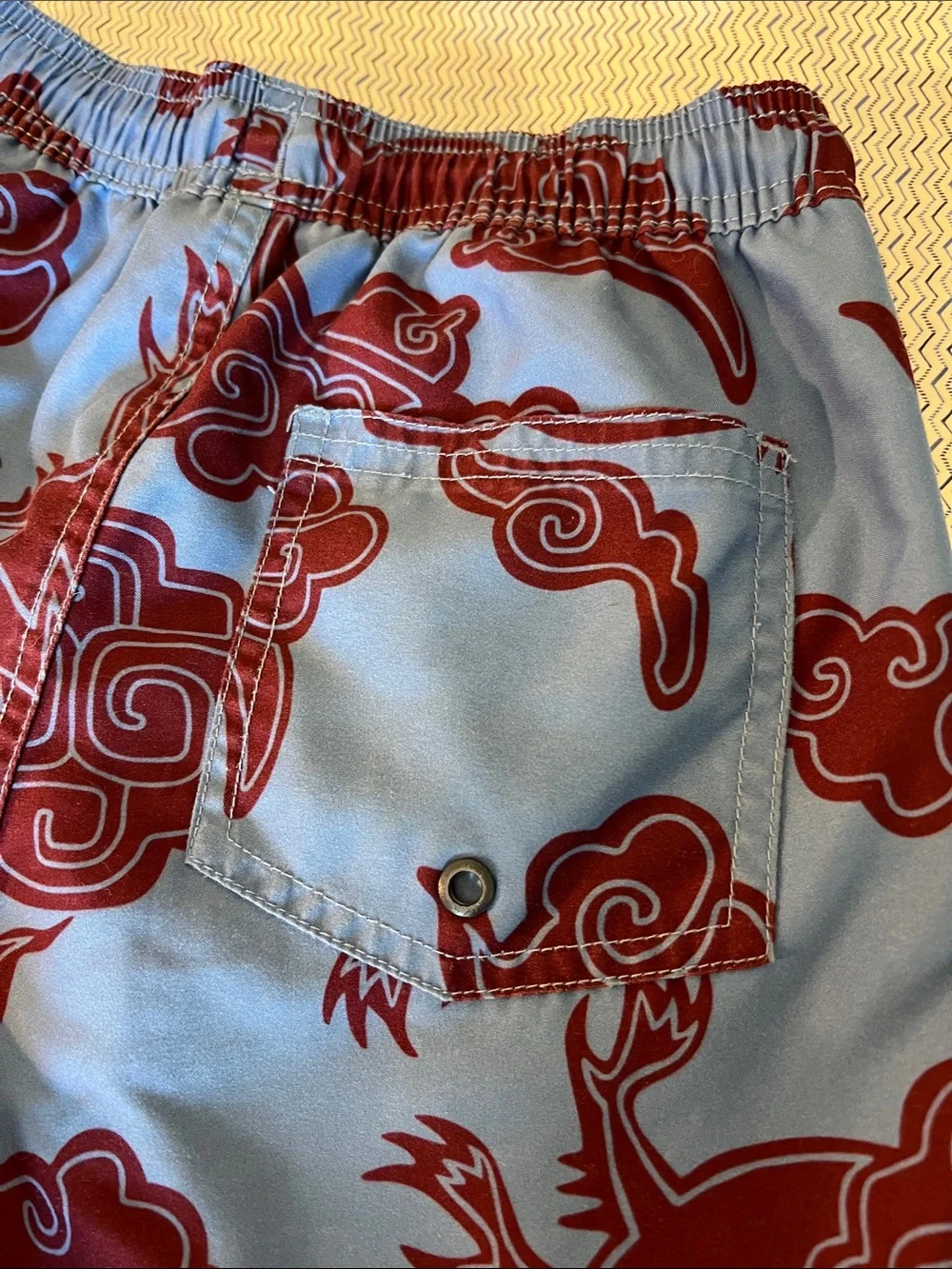 Tea Collection Blue and Maroon Dragon Swim Trunks
